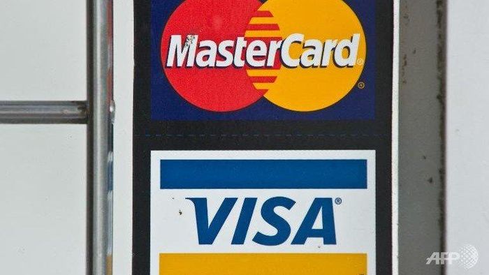 Thẻ Visa và MasterCard chiếm 74% giao dịch thanh toán tại Nga vào năm 2020. Ảnh: AFP.