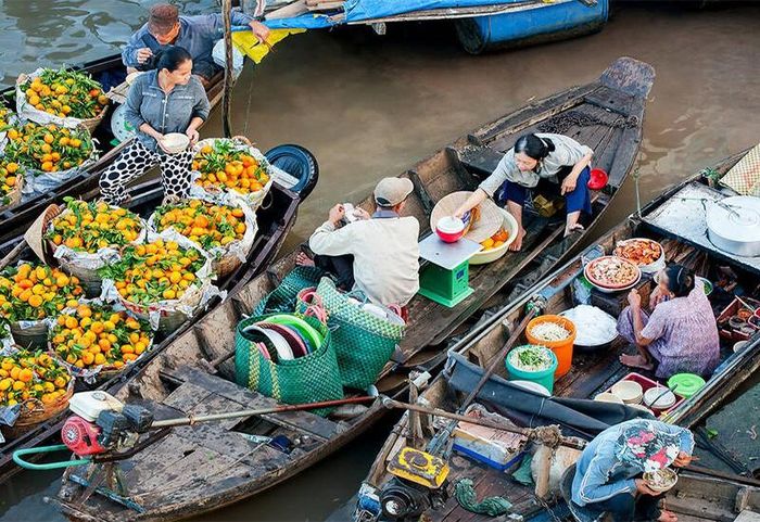 Chợ nổi Cái Răng - Cần Thơ hấp dẫn nhiều khách du lịch. Ảnh: Vietnamtourism.