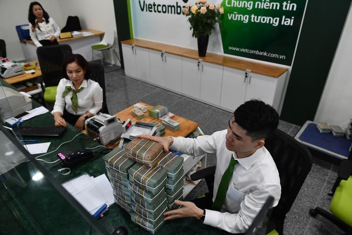  Vị thế dẫn đầu về vốn điều lệ của nhóm ngân hàng quốc doanh có thể bị phá vỡ trong năm nay. Ảnh: Hoàng Hà. 