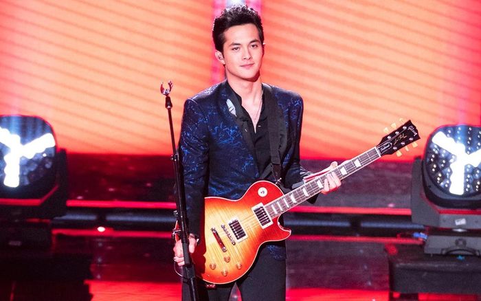  Ngôi sao nhạc đồng quê trong một buổi hòa nhạc. Ảnh: Getty. 