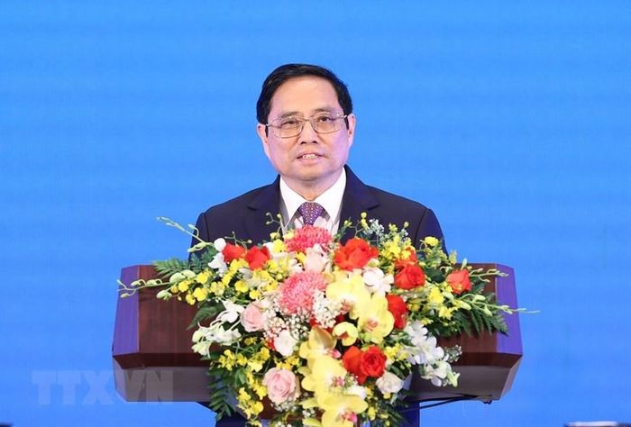 Thủ tướng Phạm Minh Chính chào mừng Thủ tướng Nhật Bản Kishida Fumio thăm chính thức Việt Nam. (Ảnh: Dương Giang/TTXVN) 