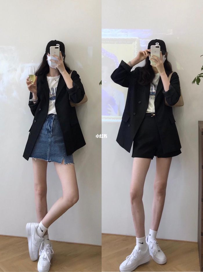 Khi diện blazer đen, nàng blogger khuyên bạn nên xắn nhẹ phần tay áo để style có nét phóng khoáng, phá cách.