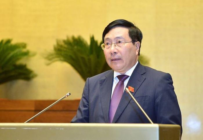 Phó Thủ tướng Thường trực Phạm Bình Minh trả lời chất vấn tại diễn đàn Quốc hội chiều 9/6