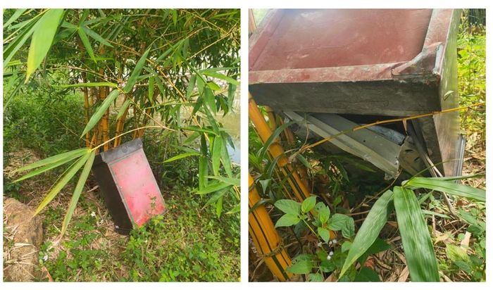 Hòm công đức ra ngoài rồi phá khóa lấy đi toàn bộ số tiền. Ảnh: Quỳnh Trang