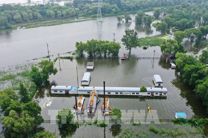Cảnh ngập lụt tại tỉnh Liêu Ninh, Trung Quốc, ngày 4/8/2022. Ảnh: AFP/ TTXVN