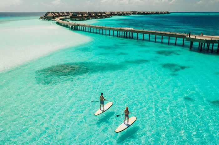 Lượng khách du lịch Nga đến châu Âu giảm trong mùa hè, nhưng lại tăng ở Maldives, một điểm nghỉ dưỡng yêu thích của những du khách Nga giàu có. Ảnh: Lonely Planet
