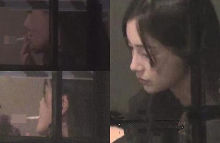 Angelababy bị bắt gặp hút thuốc lá trong quán lẩu bất chấp có biển cấm. Ảnh: Weibo.
