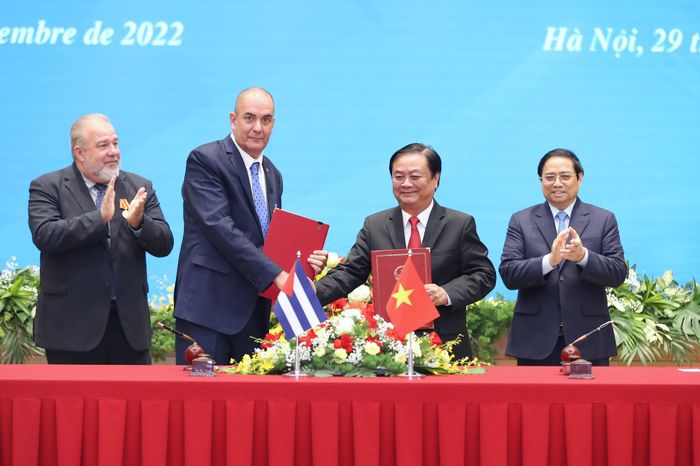 Ký kết Bản ghi nhớ giữa Bộ Nông nghiệp hai nước về hợp tác nông lương. (Ảnh: Hải Minh)
