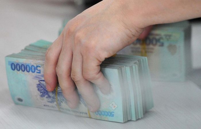 Đa số công chức, viên chức nhận mức lương rất thấp. Ảnh minh họa: Hoàng Hà