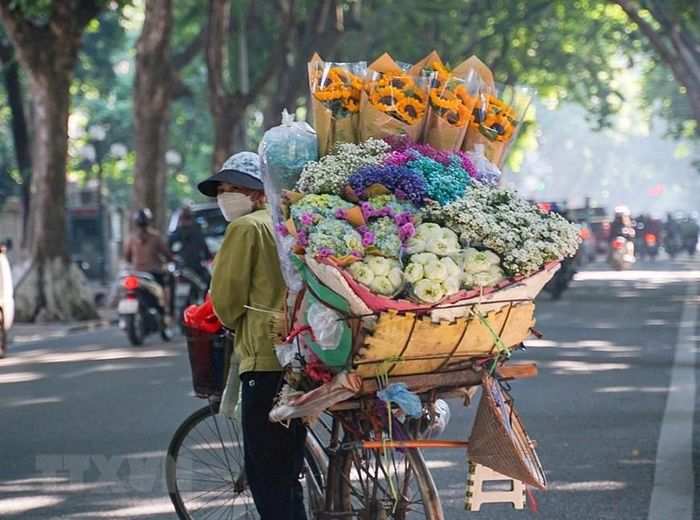  Người bán thường là phụ nữ trung niên. (Ảnh: Khánh Hòa/TTXVN) 