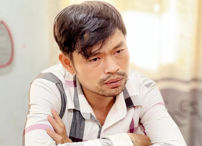 Huy bị cảnh sát tạm giữ để điều tra. Ảnh: Tiến Tầm.