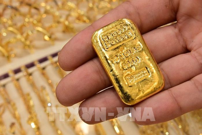Giá vàng thế giới giảm gần 30 USD trong phiên 5/12. Ảnh: TTXVN phát