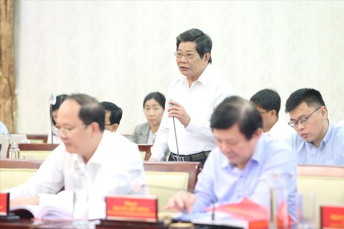 Đại biểu tham luận tại hội thảo. Ảnh: NGÔ TÙNG