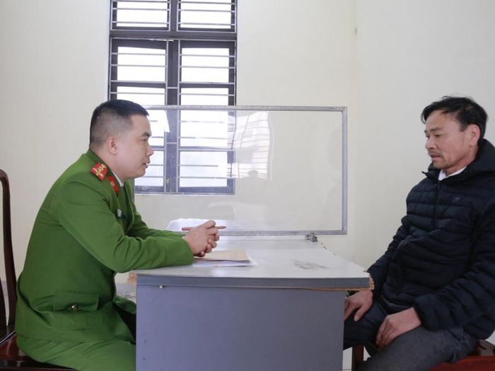 Lê Văn Nam tại cơ quan điều tra. Ảnh Công an cung cấp