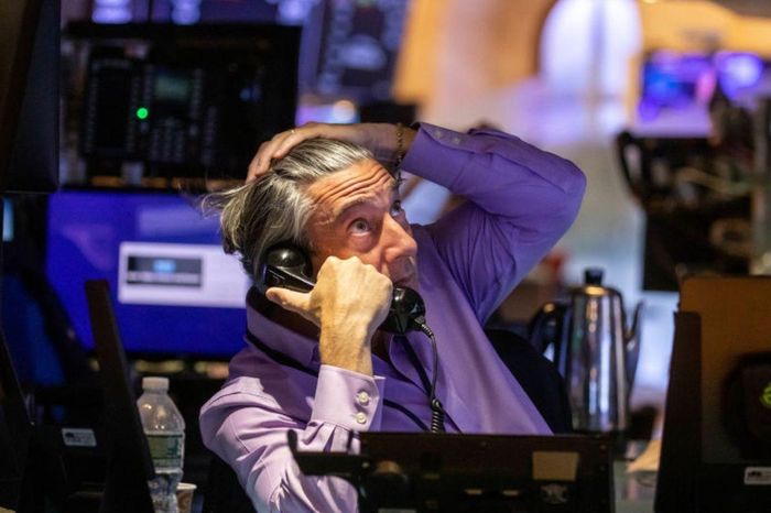  Các thị trường đỏ lửa sau bài phát biểu của ông Powell. Ảnh: Reuters. 