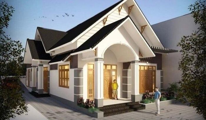 Nhà cấp 4 kiểu mái thái ngày càng được nhiều gia đình lựa chọn. Kiểu mái này vừa tạo độ cao, mang lại sự thông thoáng vừa giữ được vẻ đẹp bền vững. Nhà sử dụng tông màu trắng kết hợp các mảng sơn xám nổi bật. (Ảnh: Musk)