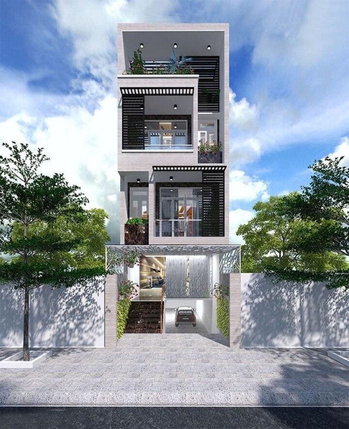 Nhà phố có gara là kiểu thiết kế thịnh hành trong xã hội hiện đại khi nhu cầu để xe của mỗi gia đình ngày càng cao. (Ảnh: Dnudecor)