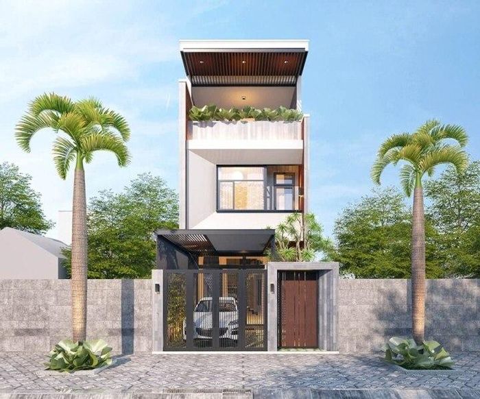 Nhà phố mặt tiền 5m khéo léo kết hợp tông màu sáng, tối mang đến vẻ đẹp hiện đại mà độc đáo. Phần ban công của tầng 2 có thể tận dụng trồng cây hoặc làm không gian thư giãn. (Ảnh: Noithattugia)