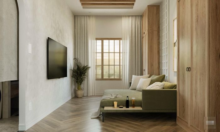 Phòng sinh hoạt chung của cả gia đình. Chiếc ghế sofa bed rộng có thể làm chỗ ngủ thoải mái nếu nhà có thêm khách. 