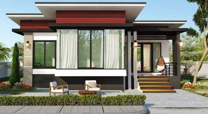 Thoạt nhìn căn nhà khá nhỏ gọn nhưng thực tế chiều sâu lên tới 20m. Mặt tiền nổi bật được tạo từ những mảng màu và hình khối hiện đại, bắt mắt. Nhà gồm 3 phòng ngủ, nền được tôn cao tránh bão lũ. (Ảnh: Thietkenhadepaau)