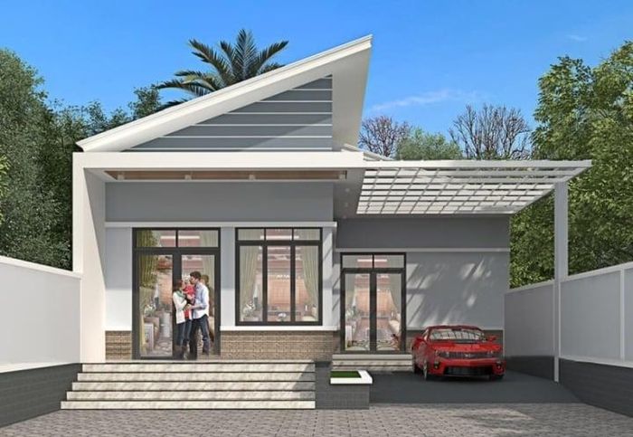 Nhà mái lệch 1 tầng hiện đại có gara để ô tô. Ngoài hệ thống cửa kính, căn nhà còn nổi bật với phần đá ốp chân tường và bậc cầu thang. (Ảnh: Noithattugia)
