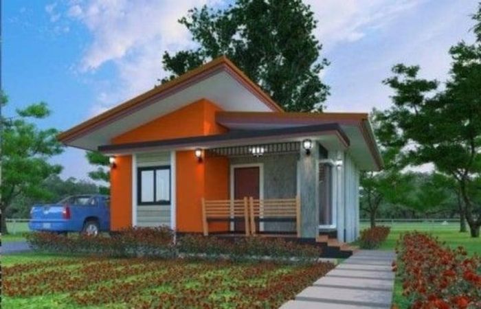 Nhà ống 1 tầng mái lệch đơn giản với gam màu rực rỡ nổi bật. Đây là mẫu thiết kế khả thi cho những gia đình có kinh tế eo hẹp. (Ảnh: Ahthomes)