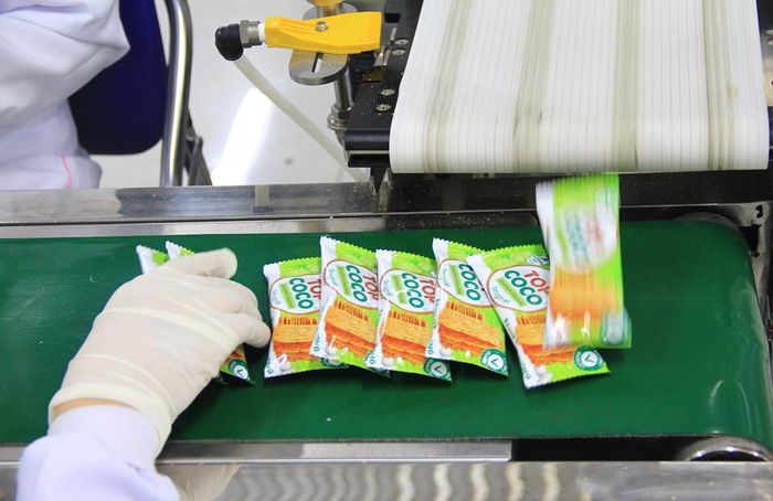 Bánh dừa nướng mè Top Coco hiện có mặt trên khắp các siêu thị trong nước và tại 5 thị trường quốc tế gồm Nhật Bản, Hàn Quốc, Lào, Mỹ, Đài Loan, Trung Quốc. Ảnh: Quang Hải