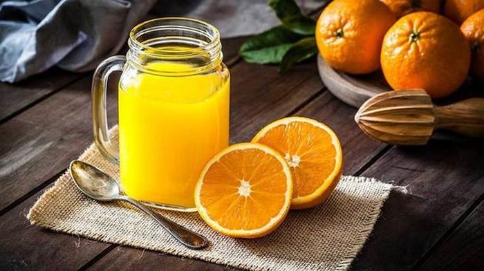 Uống nước cam thường xuyên tốt cho sức khỏe. Ảnh minh họa.