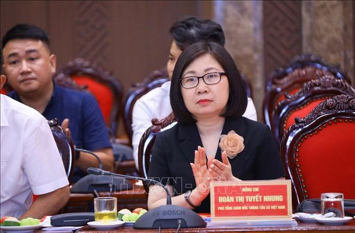 Phó Tổng Giám đốc Thông tấn xã Việt Nam Đoàn Thị Tuyết Nhung tại buổi gặp mặt. Ảnh: Văn Điệp/TTXVN