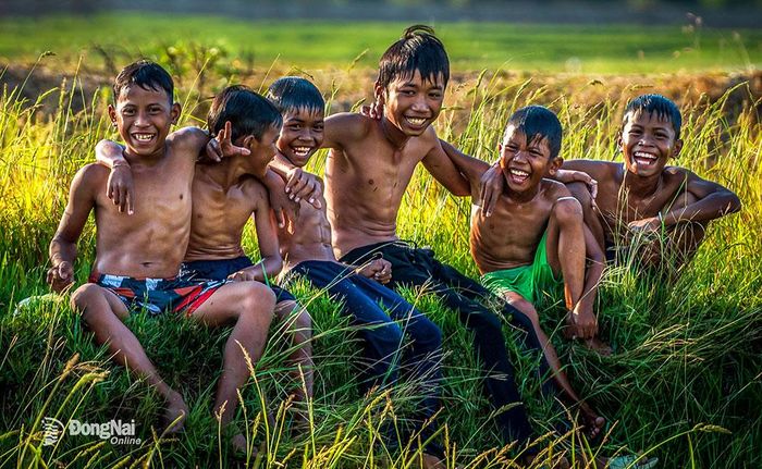 Nụ cười trẻ thơ. Ảnh: NGUYỄN NGỌC CƯỜNG
