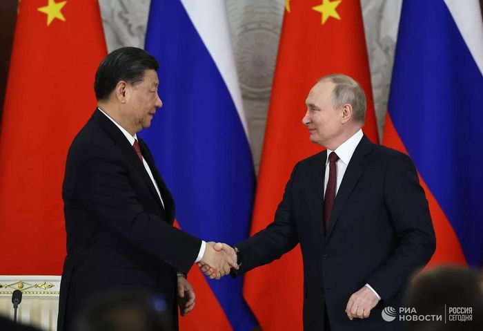 Chủ tịch Trung Quốc Tập Cận Bình (trái) và Tổng thống Nga Vladimir Putin. Ảnh: RIA Novosti