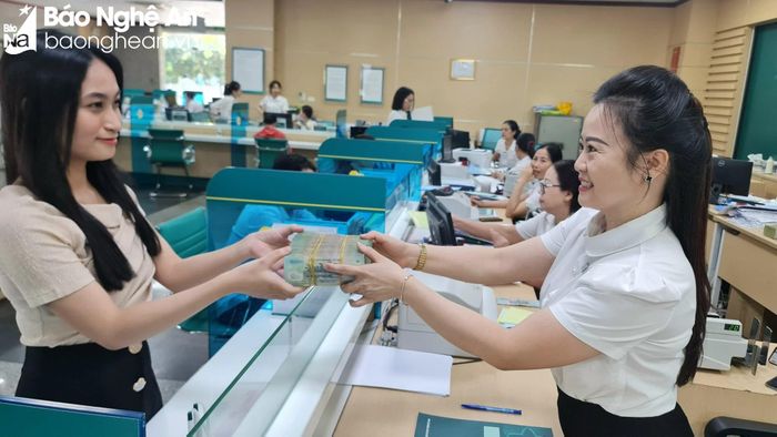  Để tăng trưởng tín dụng cần sự chung tay của nhiều bộ, ngành để cải thiện khả năng hấp thụ vốn của nền kinh tế. Ảnh: Thu Huyền 