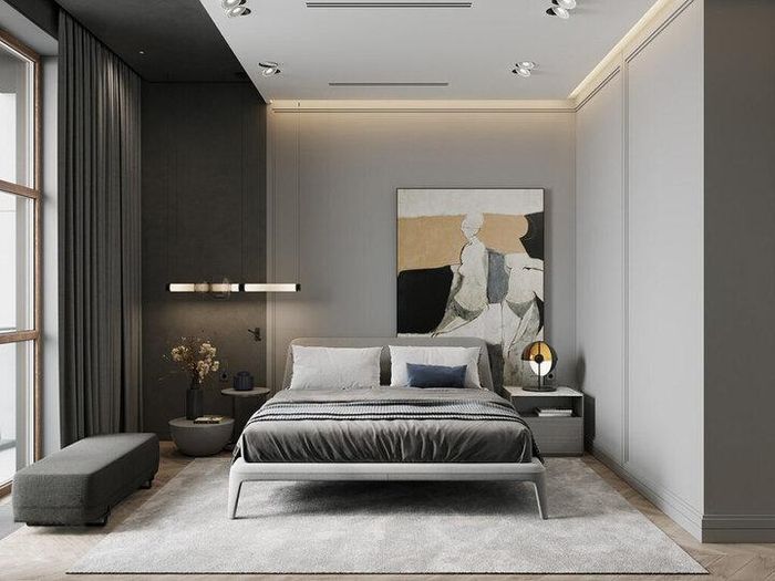 Thiết kế nội thất phòng ngủ tone màu xám với điểm nhấn trung tâm đầy ấn tượng là chiếc giường bọc nệm trẻ trung, êm ái. Chiếc cửa sổ lớn giúp đón nắng, lưu thông không khí mang tới không gian thoải mái, thư giãn