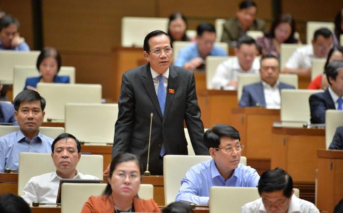 Bộ trưởng Bộ Lao động, Thương binh và Xã hội Đào Ngọc Dung trả lời chất vấn