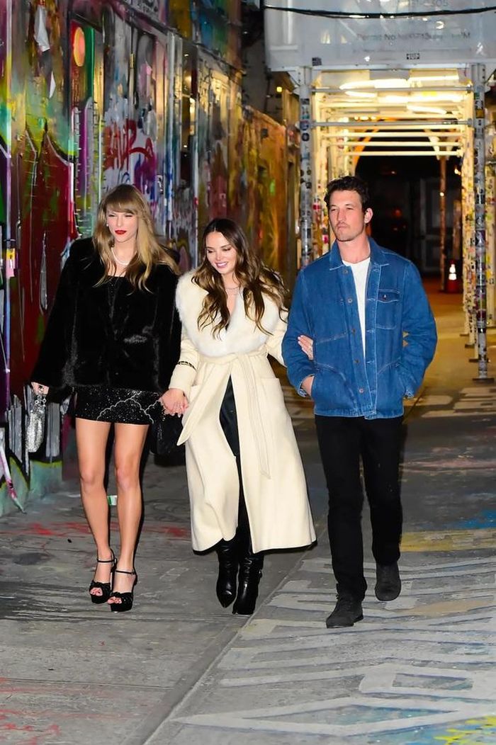 Miles Teller và vợ, Keleigh Sperry, được chụp ảnh rời đi cùng Taylor Swift. GC Images