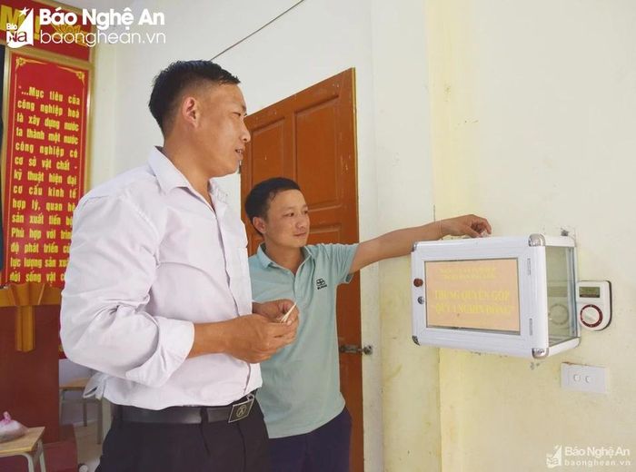 Đảng viên Chi bộ bản Phá Lõm, xã Tam Hợp góp "Quỹ 1000 đồng". Ảnh: K.L
