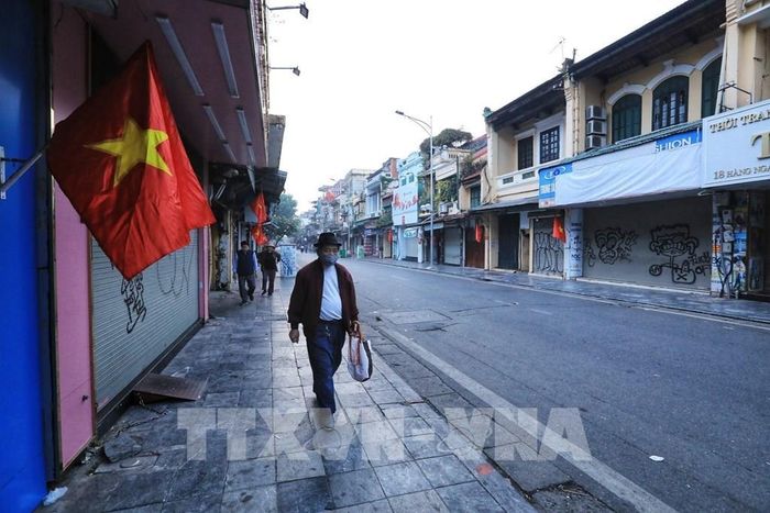 Phố Hàng Đào vắng vẻ ngày đầu năm. Ảnh: Tuấn Anh - TTXVN