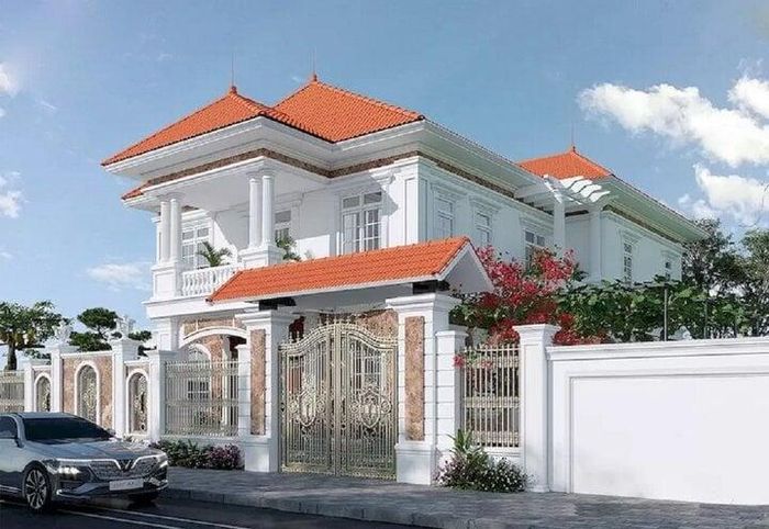 Mẫu biệt thự 2 tầng với chi phí xây dựng khoảng 1 tỷ có mái đỏ tươi và màu trắng chủ đạo được lựa chọn cho hầu hết các mẫu biệt thự bởi chúng khiến kiến trúc trông rộng rãi và mát mẻ hơn. Màu trắng cũng là một màu đặc trưng của phong cách này. (Ảnh: Vinavic)