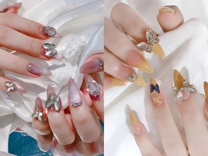 Nail xinh đón Tết đính charm cầu kỳ, bắt mắt.