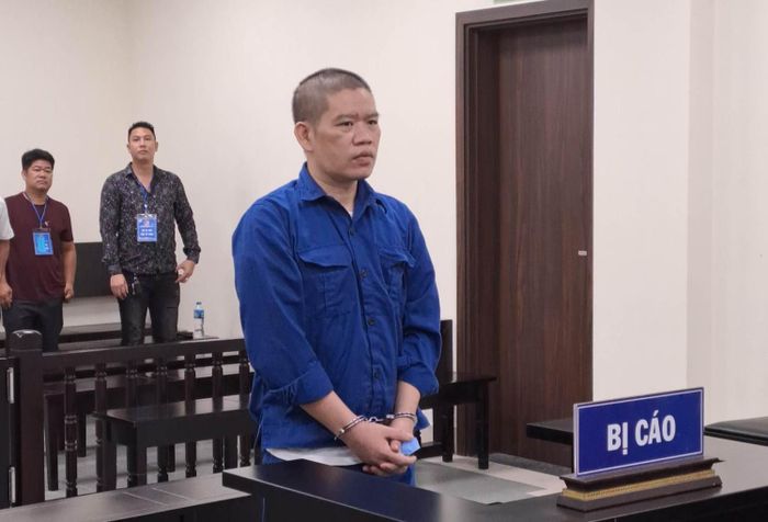 "Thầy phong thủy" Lê Văn Tình tại tòa. Ảnh: BT