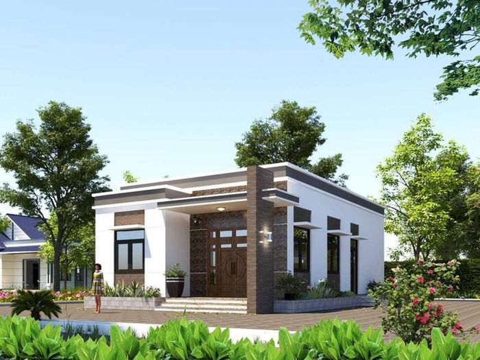 Do diện tích có phần hạn chế, mẫu nhà cấp 4 không quá cầu kỳ, các chi tiết phức tạp đều bị lược bỏ. Việc lựa chọn màu sơn trắng kết hợp với màu xám cũng giúp không gian nhà ở có cảm giác mở rộng hơn. Ảnh: Xdnamthienphat