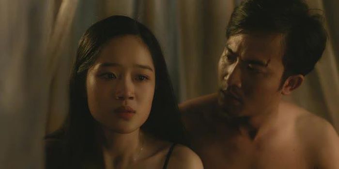 Doãn Quốc Đam và Cao Thùy Linh trong phim "Đào, phở và piano". Ảnh: ĐPCC