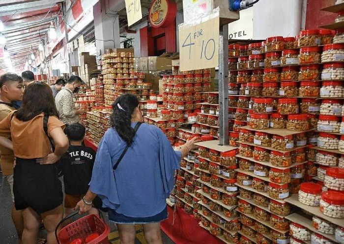 Lãng phí thực phẩm trong mùa lễ hội có thể tăng đến 30%. Ảnh: The Straits Times.