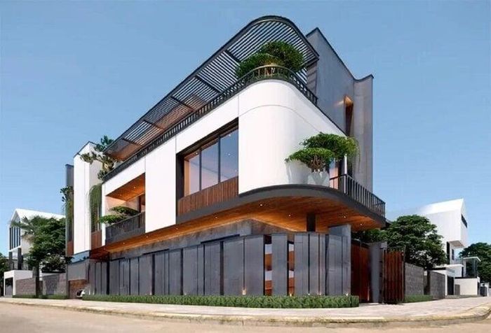 Mẫu nhà 2 mặt tiền với thiết kế độc đáo, 2 màu chủ đạo nâu và trắng khiến ngôi nhà trông nổi bật. (Ảnh: Trongoixaynha)