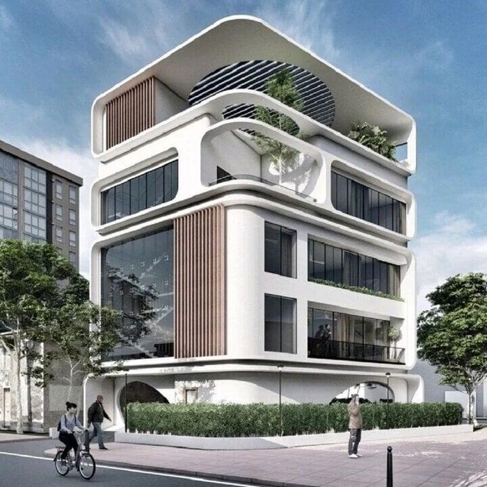 Mẫu nhà lô góc có thiết kế độc lạ với màu trắng chủ đạo, nhiều đường bo tròn khiến ngôi nhà trông mềm mại, độc đáo. (Ảnh: Trongoixaynha)