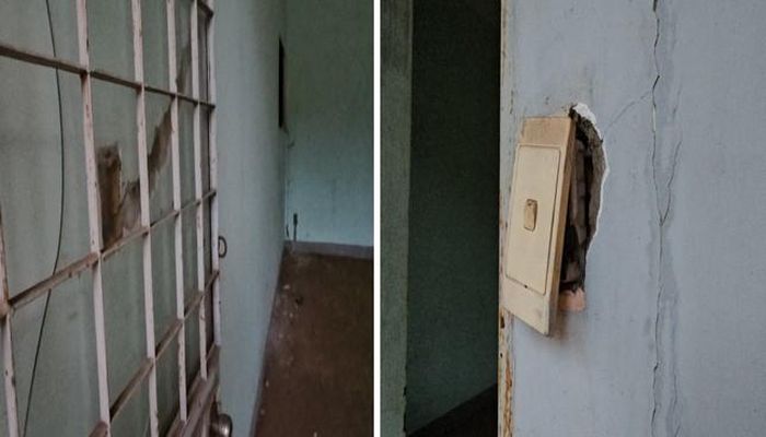 Tường, ổ cắm điện đã bị hư hỏng.