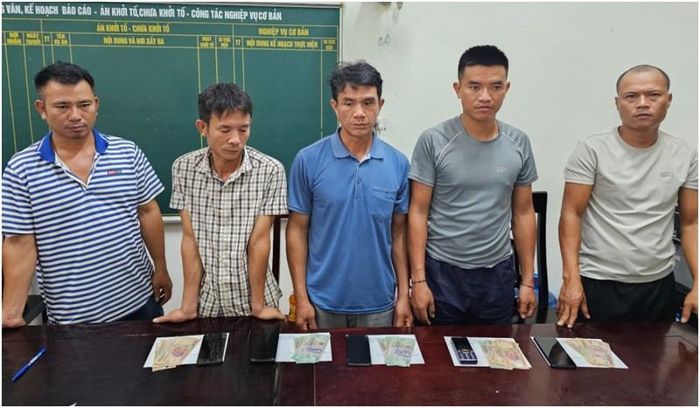 Các đối tượng tại cơ quan Công an. Ảnh CANA.