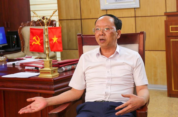 Phó Chủ tịch UBND tỉnh Bùi Thanh An trao đổi về kết quả 10 năm thực hiện Chỉ thị 40 trên địa bàn Nghệ An. Ảnh: Thu Huyền