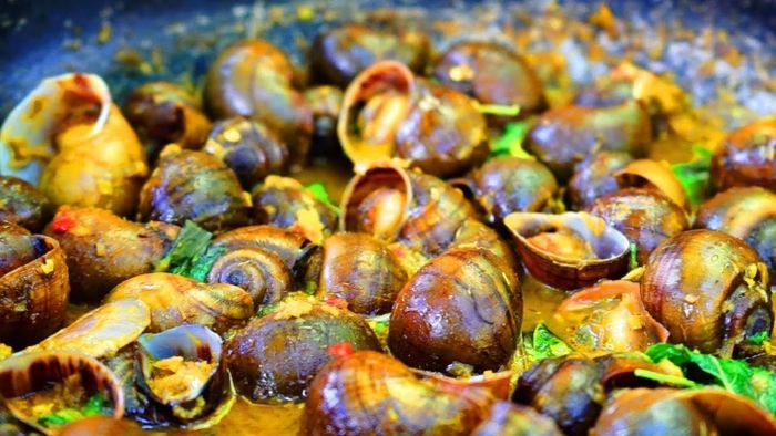 Thịt ốc có vị ngọt tự nhiên, kết hợp hài hòa với các loại gia vị, tạo nên hương vị khó quên. Ảnh: My tour