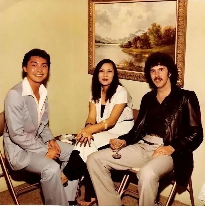 Tôn Long (trái) và vợ cũ. Ảnh: QQ.
